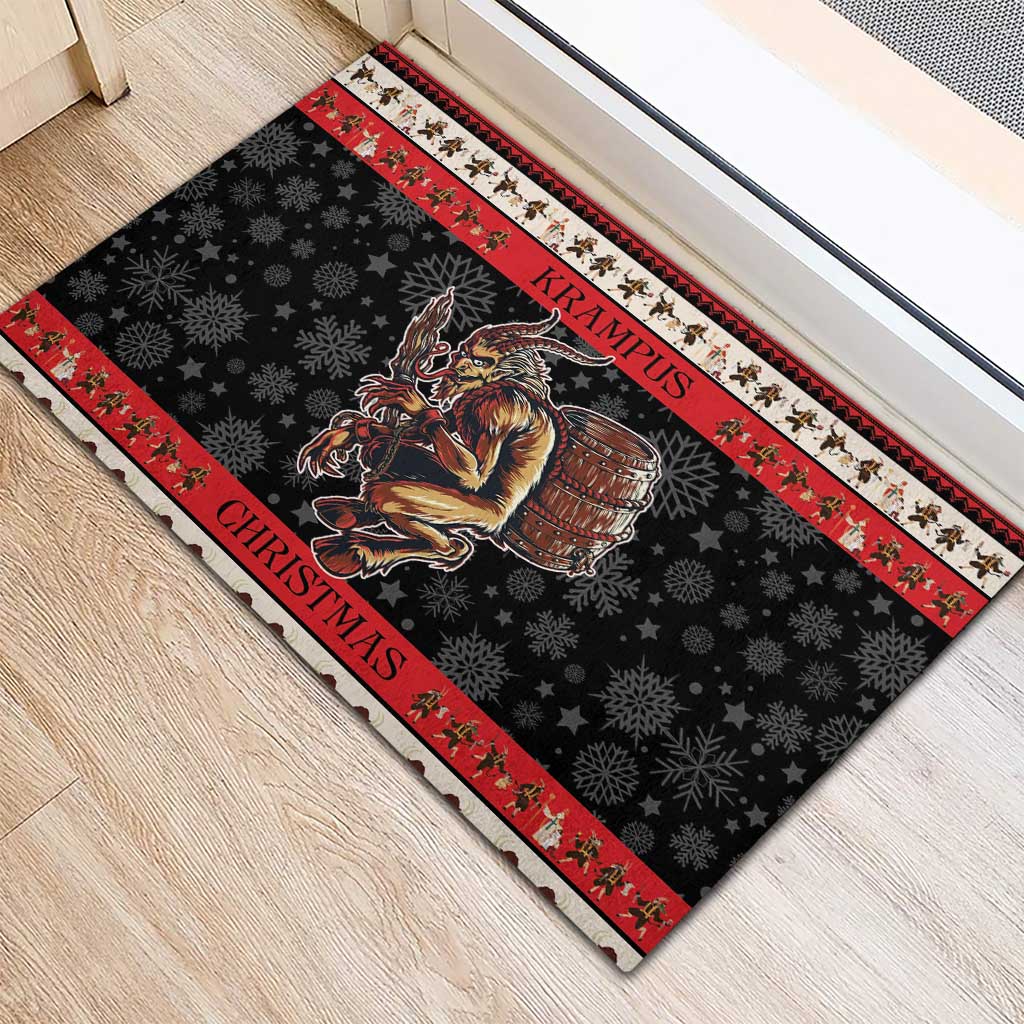 Red and black rubber Krampus Christmas doormat with snowflakes and striped border
