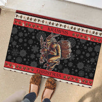 Black Krampus Christmas rubber doormat with red border, snowflakes, and “CHRISTMAS” text