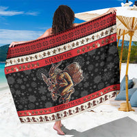 Krampus Christmas sarong, black with red trim, snowflake pattern and central monster print