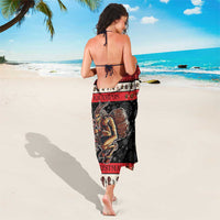 Krampus Christmas sarong, black with red trim and Krampus graphic; wrap around length