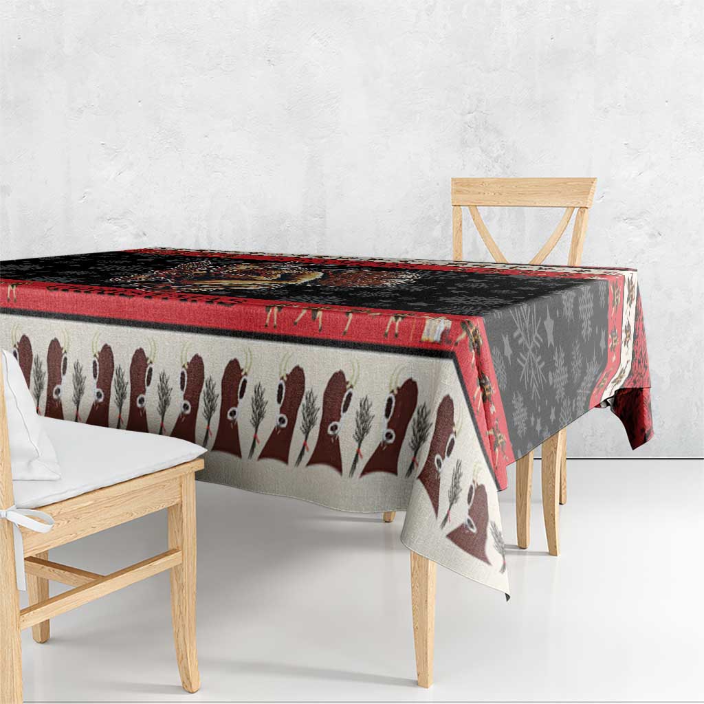 Krampus-themed Christmas tablecloth side view with devil silhouette strip and red border
