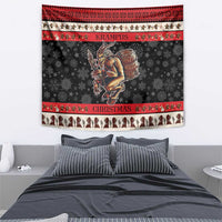 Christmas devil wall tapestry showing Krampus with a barrel, dark gray and red top/bottom bands
