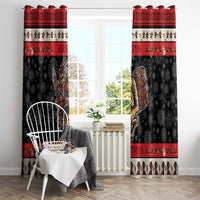 Two black and red Krampus Christmas window curtains with red top trim and snowflake background