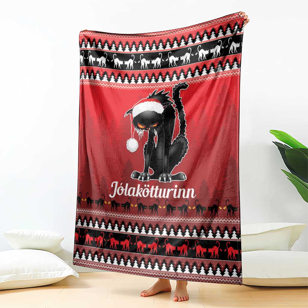 Red Iceland blanket featuring a black cat face with white hat and holiday animal stripe borders