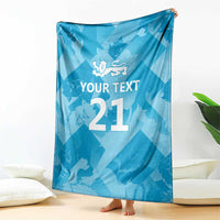 Blue custom cricket throw blanket draped with lion emblem, 'YOUR TEXT', and number 21