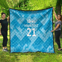 Blue diamond-quilted blanket with white lion crest, custom text, and large “21”.