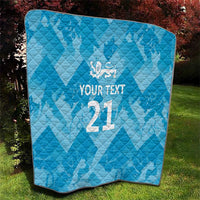 Blue quilted throw with white lion crest and custom text, featuring large “21”.