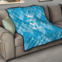 Blue quilted throw with white crest and custom text, large “21” centered.