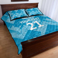 Blue quilt bed set with quilted texture, YOUR TEXT and large number graphic; 2 pillowcases.