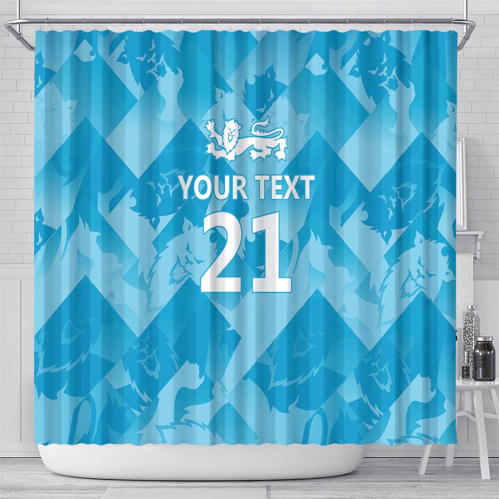 Blue shower curtain with three lions crest and custom text 21, wide front view