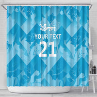 Blue shower curtain with three lions crest and custom text 21, wide front view