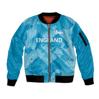 Blue bomber jacket with front zip, black ribbed cuffs, and white lion crest graphic