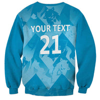 Blue crewneck sweatshirt with long sleeves and customizable text 21 on back