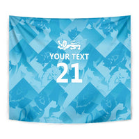 Close-up blue tapestry showing lion crest and 'YOUR TEXT 21' text