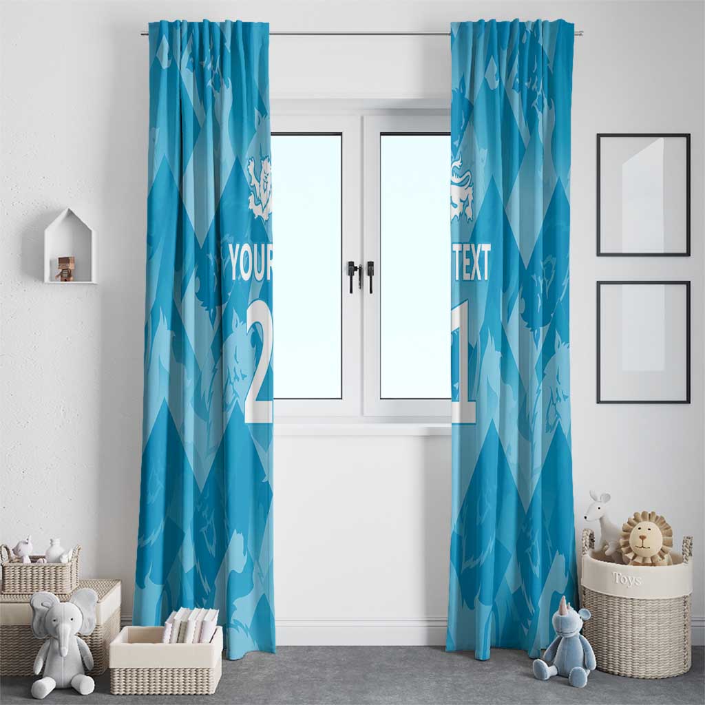 Blue window curtain panels with lions motif and custom text, hanging on a doorway window.