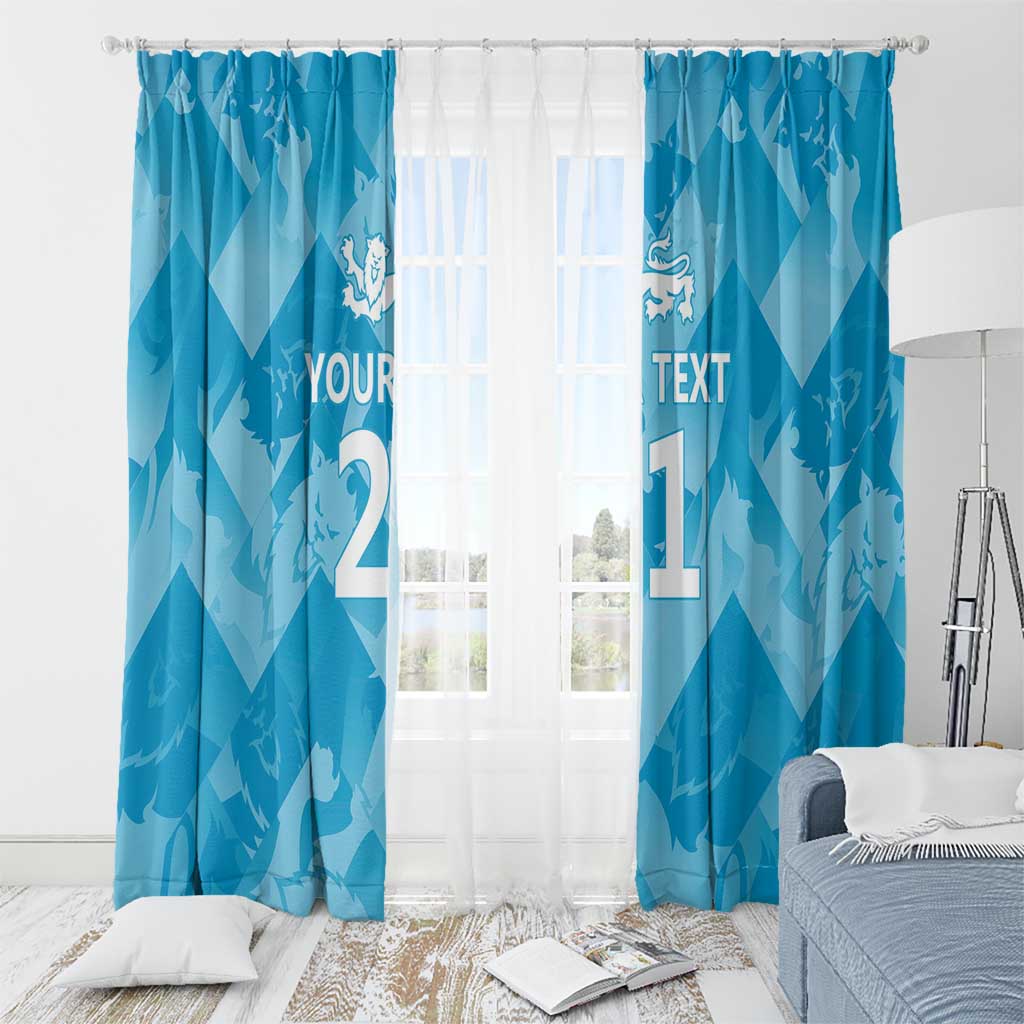 Blue window curtain panels with lions motif, custom text, and rod-mounted header.