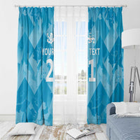 Blue window curtain panels with lions motif, custom text, and rod-mounted header.