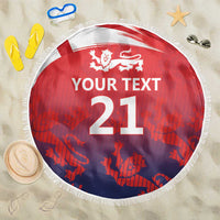 Red round beach blanket with fringe, lion crest and “YOUR TEXT 21” design