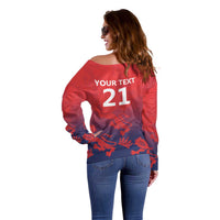 Red off-shoulder sweater back with YOUR TEXT 21 and navy lion graphic