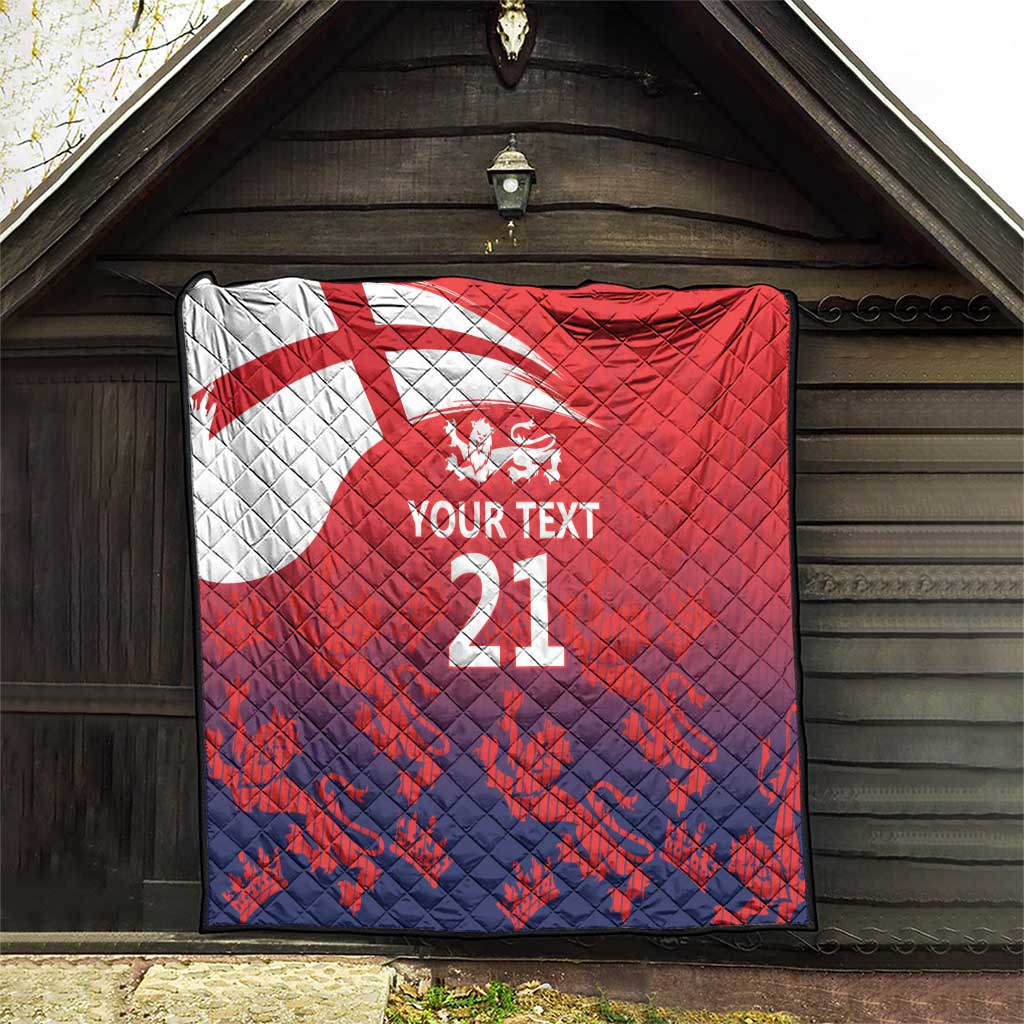 Red and navy custom quilt with Union Jack, lion crest, and 'YOUR TEXT 21' displayed