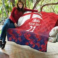 Red and navy quilt with Union Jack, lion crest, and 'YOUR TEXT 21' quilted diamond stitching