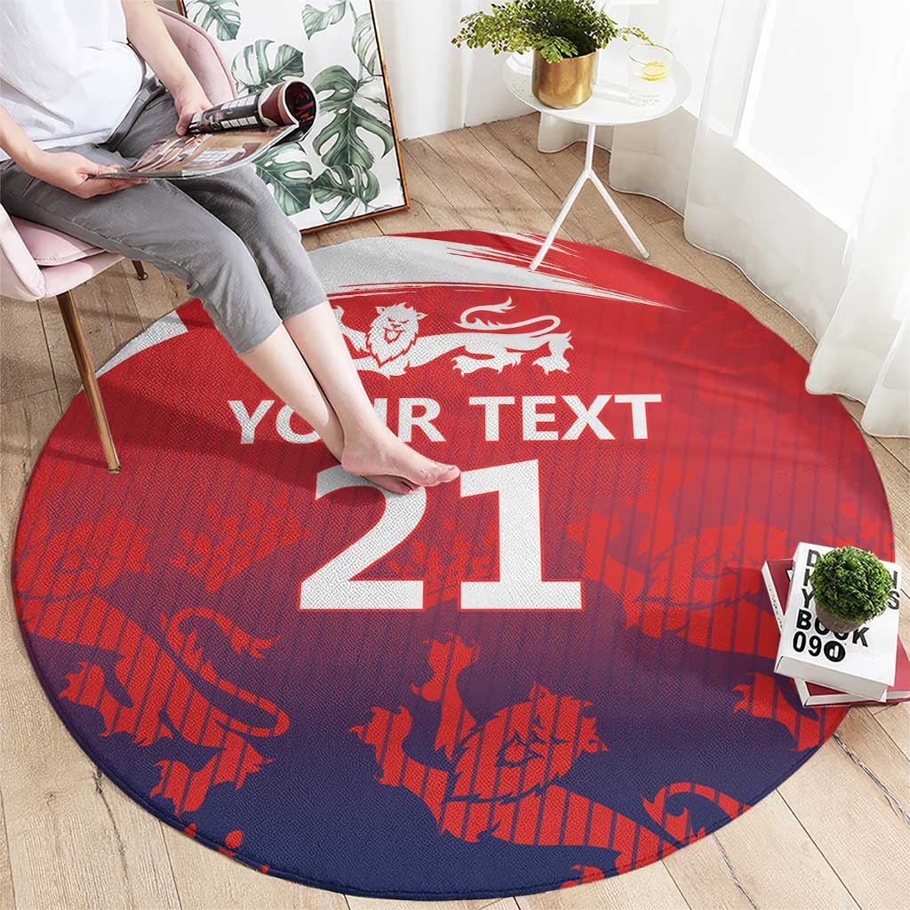 Red and navy round cricket rug with white border, 'YOUR TEXT' and large '21' in center