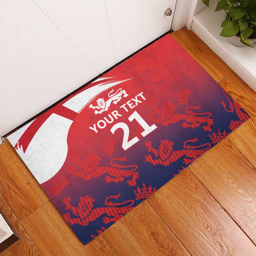 Red rubber doormat with blue border, white England flag, three lions and custom 21