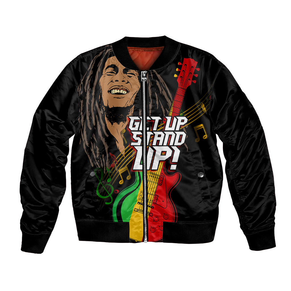 Black bomber jacket with multicolored graphic of face, guitar, and music notes