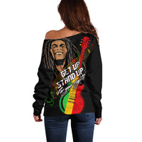 Black off-shoulder sweater, back view, reggae guitar portrait graphic