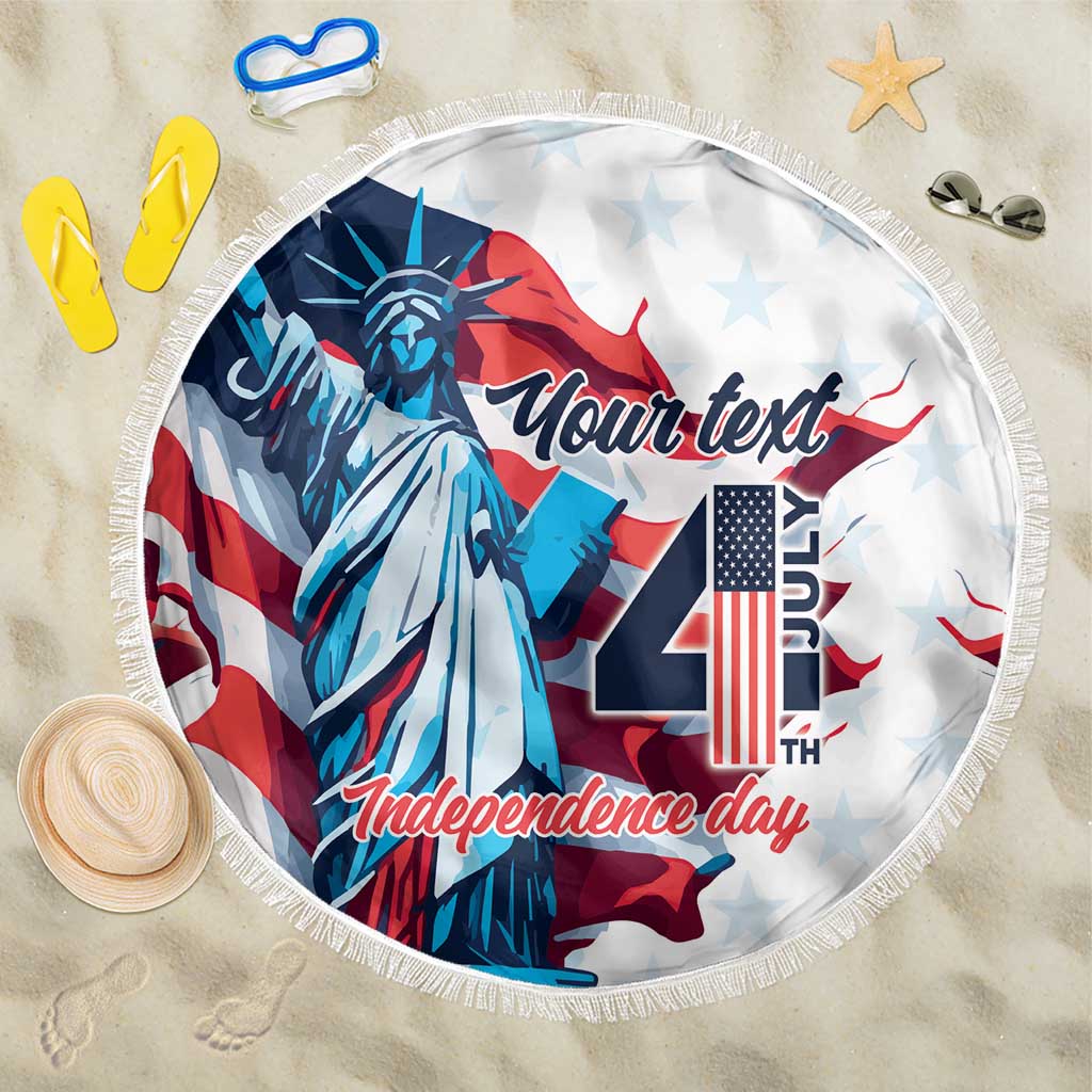 Round Independence Day beach blanket with Statue of Liberty graphic and fringe trim