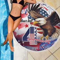 Round white-fringed beach blanket with eagle, stars, and Independence Day design
