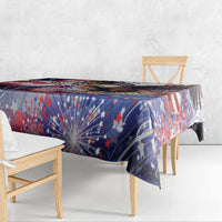 Patriotic tablecloth draped on a wooden bench with blue fireworks and star pattern