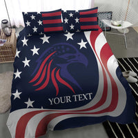 Blue patriotic comforter with red-and-white stars and eagle graphic, paired with two matching shams