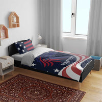 Patriotic comforter set on bed with blue eagle-and-stars design and two matching pillow shams