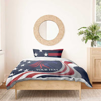 Patriotic bedding set with blue comforter featuring stars and eagle graphic, plus two pillows