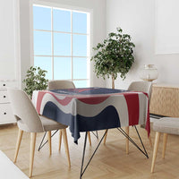 Patriotic navy tablecloth with red and white curved stripes, draped over dining table