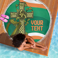 Round green beach blanket with fringe border, Celtic cross knot and 'Your Text' design
