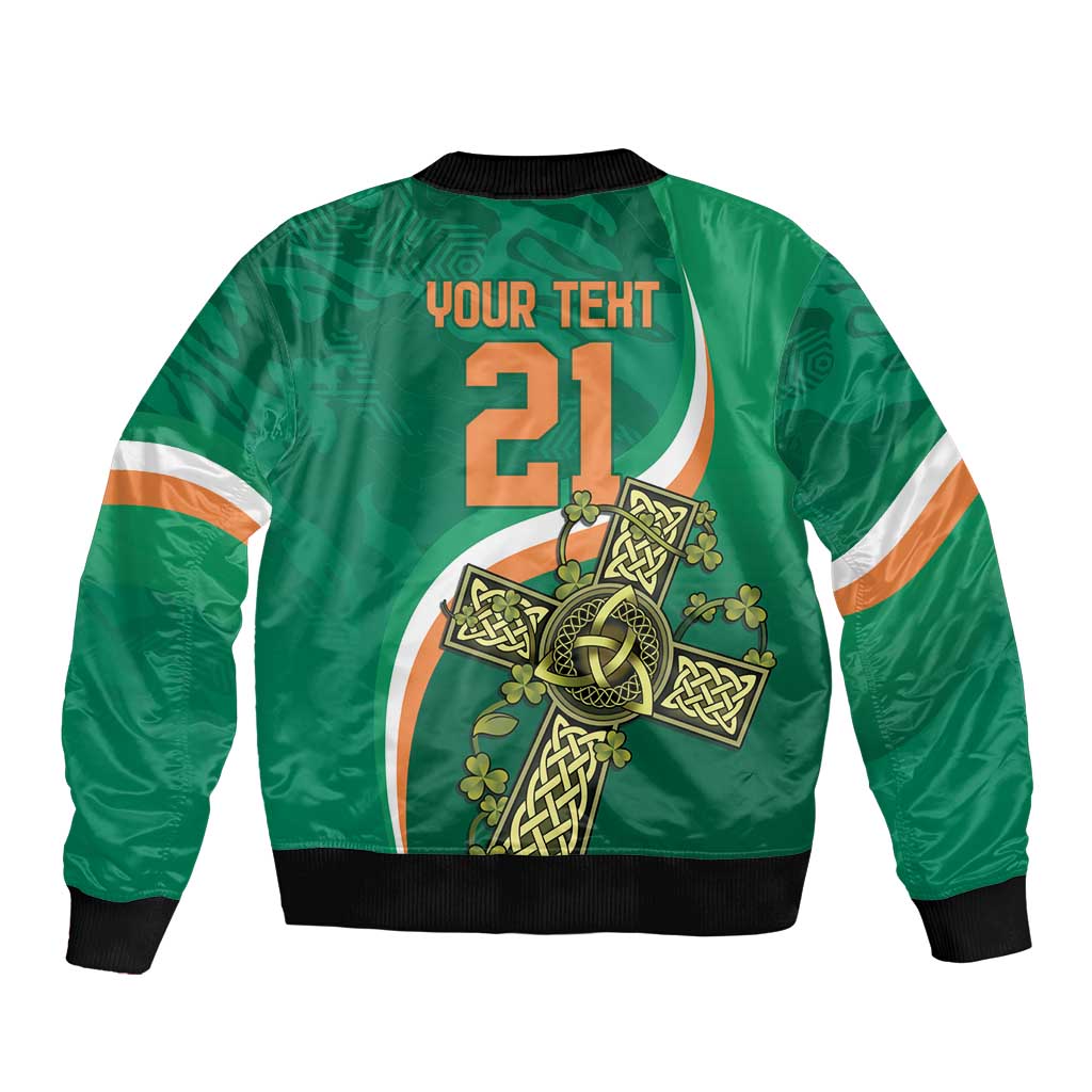 Green bomber jacket with back graphic Celtic knot cross emblem and black ribbed cuffs