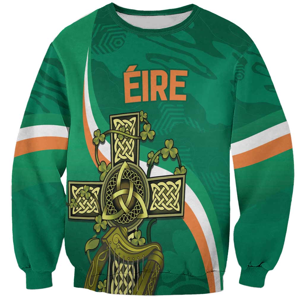 Green rugby sweatshirt with white-and-orange sleeve stripes and Celtic knot crest graphic