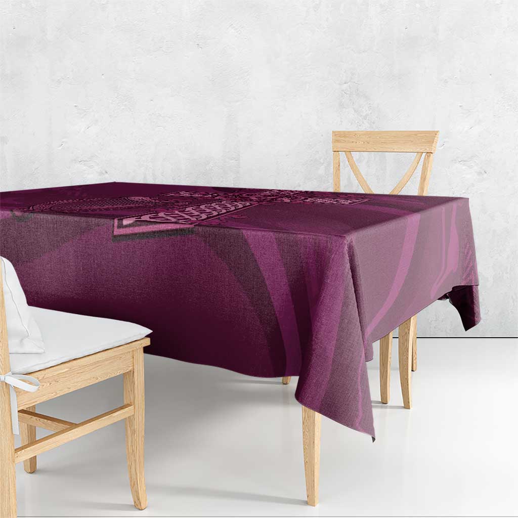 Maroon Celtic knot tablecloth draped over dining table with corner hanging