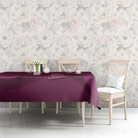 Maroon Celtic knot tablecloth on table with small floral decor and border design