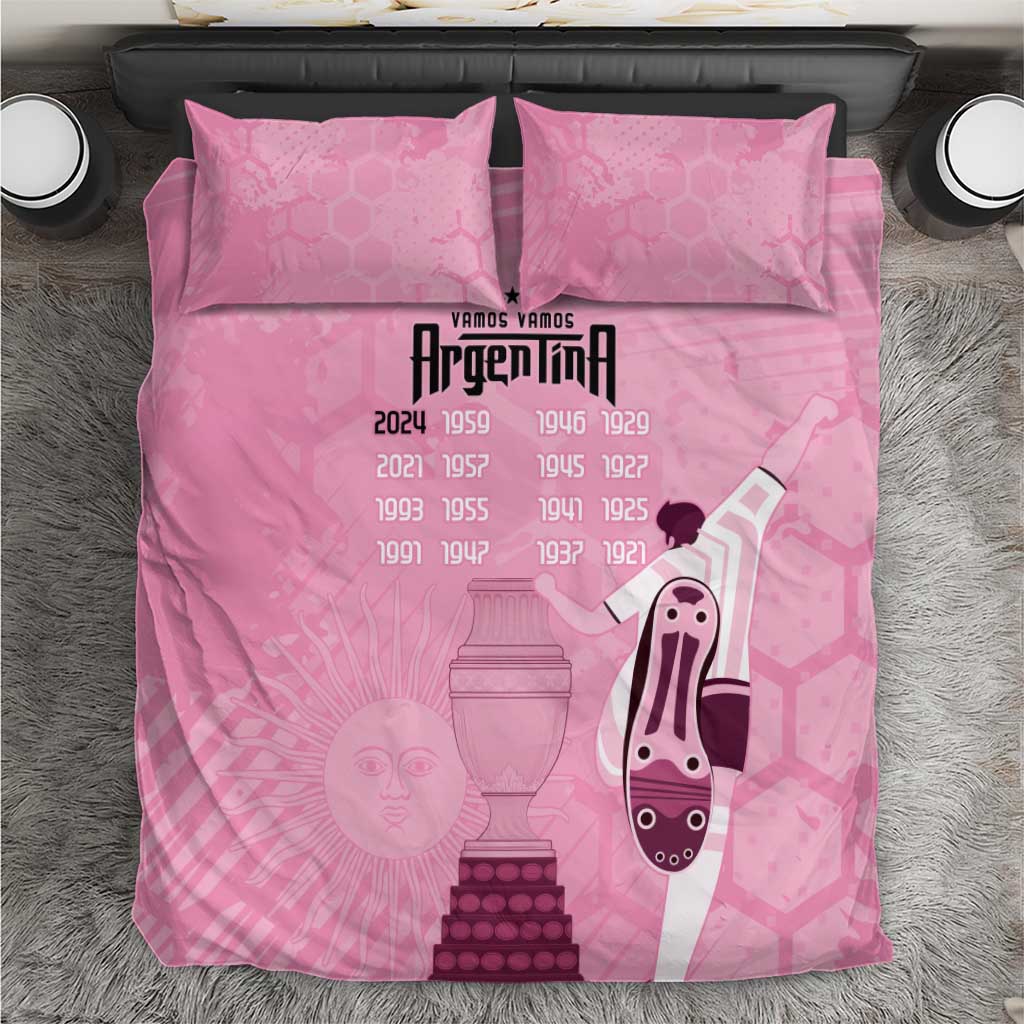Pink comforter set with two pillows, Argentina-themed trophy and mascot graphic