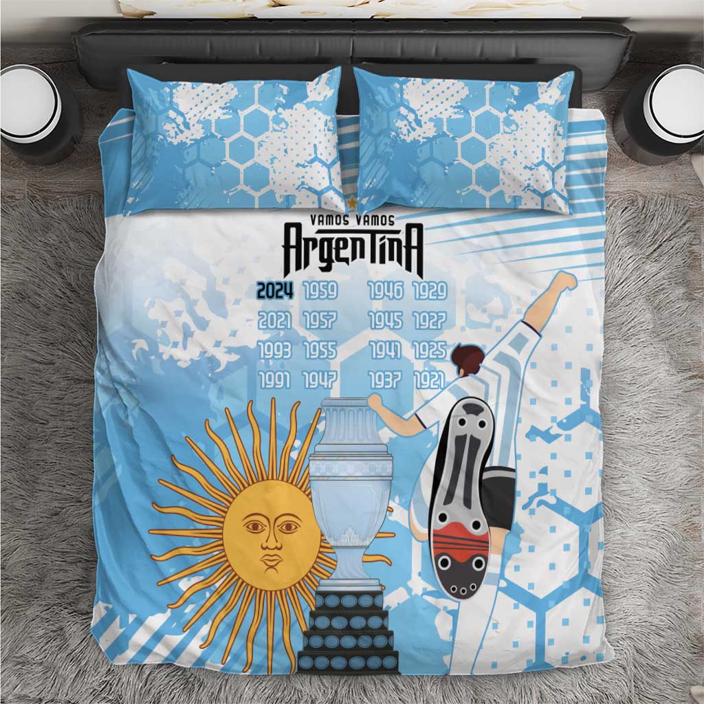 Blue bedding set with sun, trophy, and soccer ball graphic on duvet and pillowcases