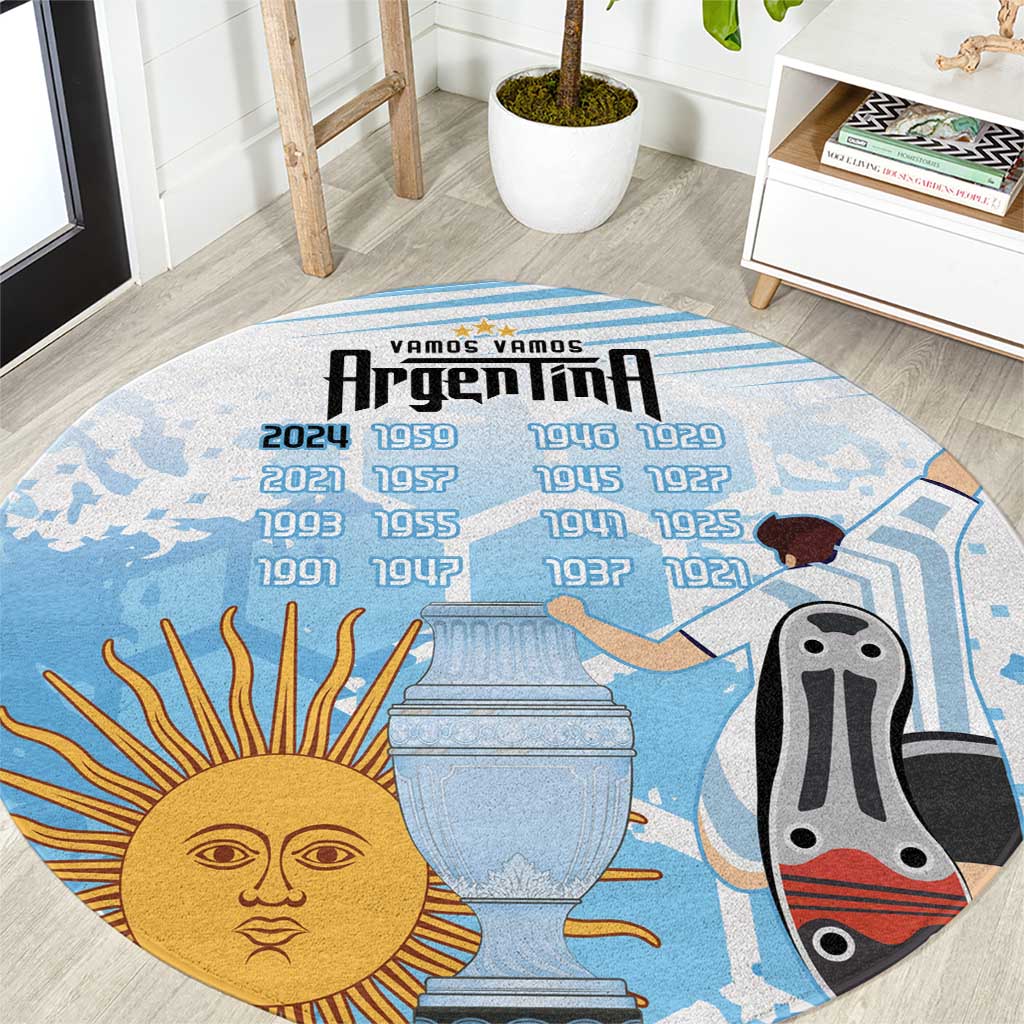 Round blue Argentina-themed carpet with sun face, trophy, and soccer ball graphics