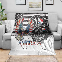 White American eagle and dartboard graphic blanket draped over a couch with “AMERICA”