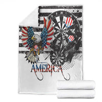 White American-themed blanket with eagle, dartboard art, “AMERICA” text; folded with stacks