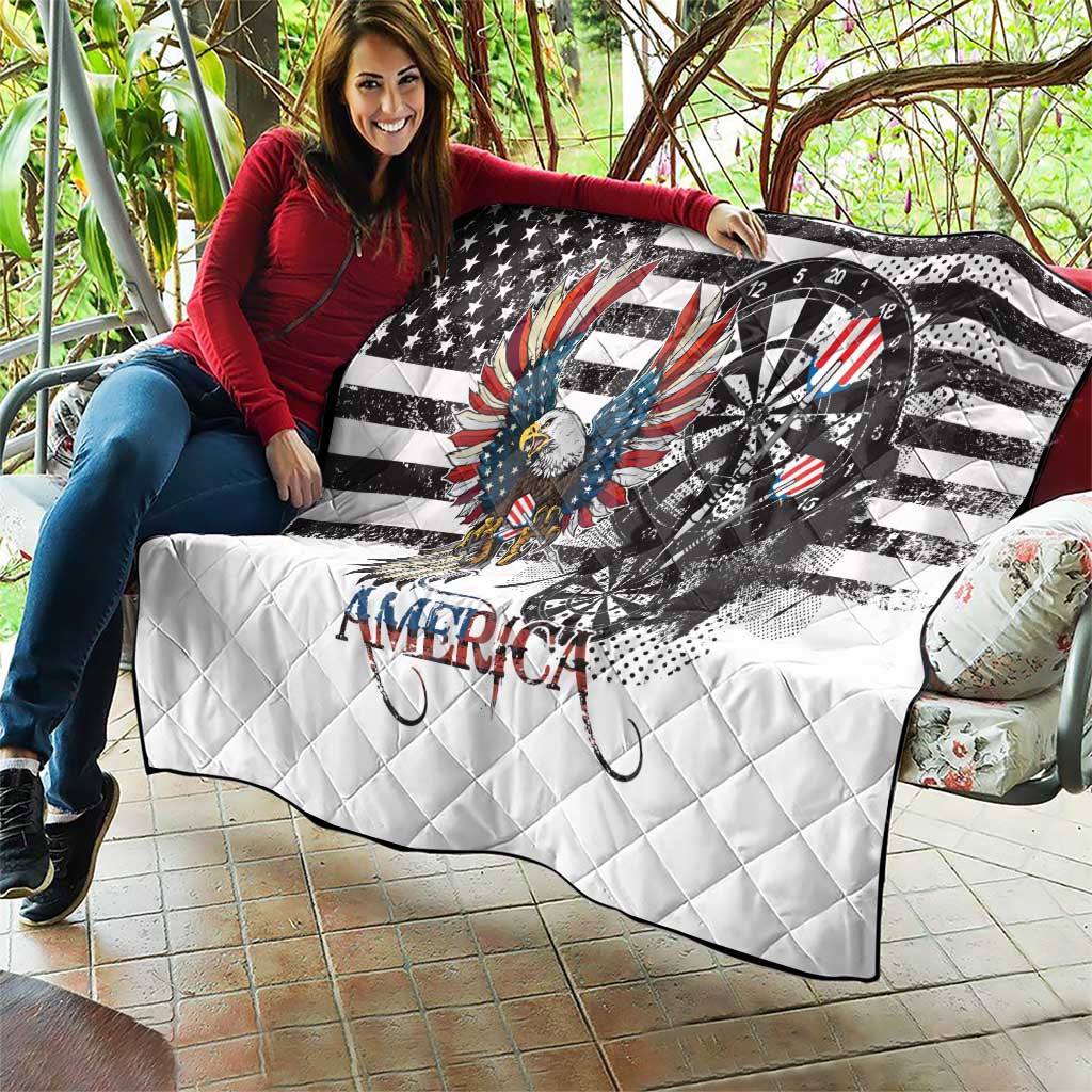 Quilt held outdoors in front view: white fabric with grunge bald eagle and dartboard