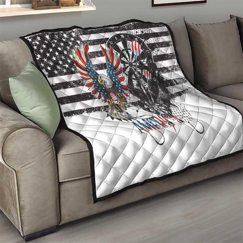 White quilt on sofa featuring grunge bald eagle, black dartboard, and star-striped design