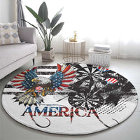 Round area rug with eagle artwork, “AMERICA” wordmark, and black dartboard grunge print
