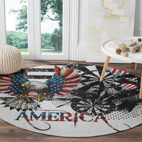 Round area rug featuring eagle head and “AMERICA” lettering over black dartboard print